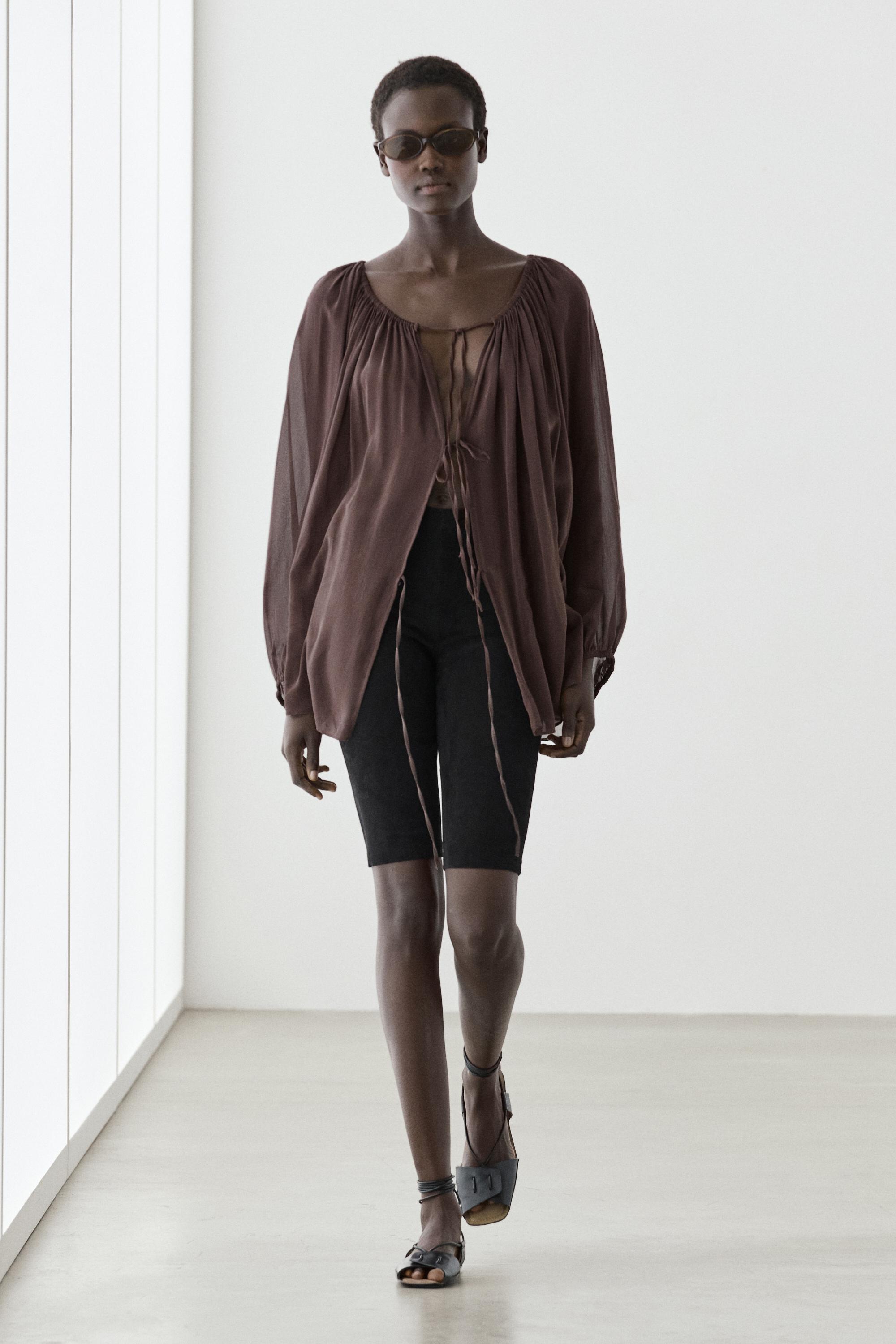 Flowing shirt with gathered details